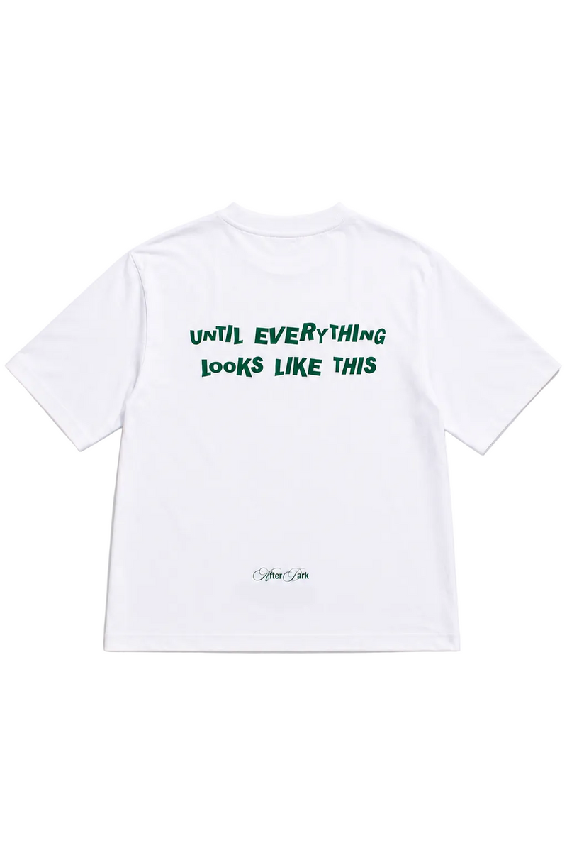 Retro della t-shirt oversize bianca UNTIL EVERYTHING LOOKS LIKE THIS di 4AM Season con grafica verde stampata sul retro